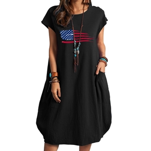 Detail of loose black cotton linen dress with American flag print and functional pocket