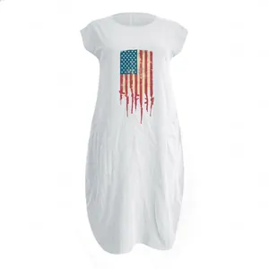 Detail of white cotton linen maxi dress featuring a vintage US flag and rifle art print