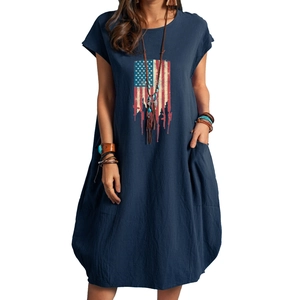 Detail view of navy blue cotton linen dress featuring pockets and USA flag print
