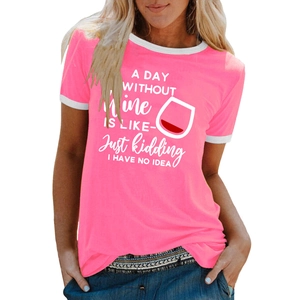 Detail of pink ringer t-shirt with white contrast trim and wine glass graphic print