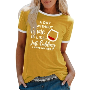 Detail of yellow ringer tee featuring a wine graphic and humorous printed slogan