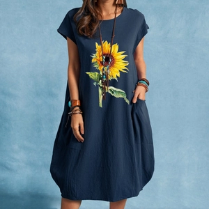 Vestido oversize de algodón y lino azul marino con estampado de girasoles y bolsillos