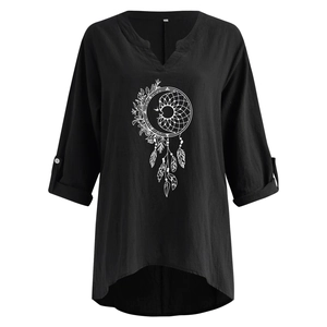 Detail view of cotton linen V-neck blouse with white dreamcatcher and moon print