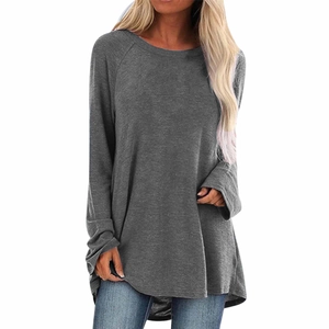 Women's loose dark grey long sleeve raglan tunic top with curved hem and crew neck