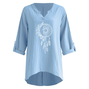 Detail of V-neck cotton linen blouse featuring dreamcatcher print and high-low hem