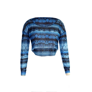 Detail of blue snakeskin print crop top featuring an asymmetrical curved hemline