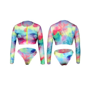 Flat lay of colorful tie-dye long sleeve two-piece bikini set with neon yellow zipper