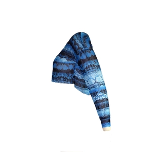 Detailed side view of blue snake skin print long sleeve crop top with mesh texture