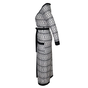 Detail of long cardigan with black and white geometric print and waist tie belt