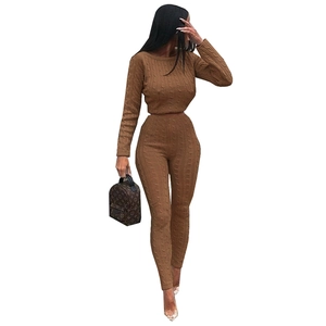 Close-up of brown cable knit pattern on two-piece high-stretch slim-fit sweater set