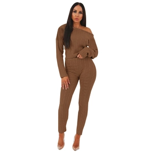 Detailed close-up of brown cable knit texture on a high-stretch two-piece lounge set