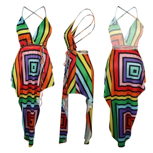 Macro view of women's deep V-neck dress with colorful geometric patterns and backless design