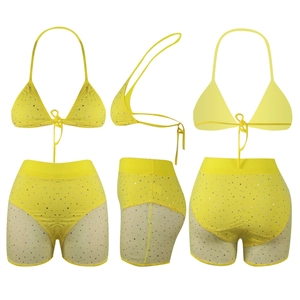 Detail of neon yellow bikini set with colorful rhinestones and mesh side shorts