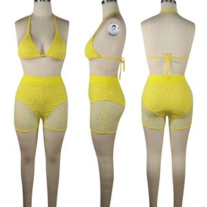 Three-view display of yellow two-piece swimsuit with sequins and mesh splice details