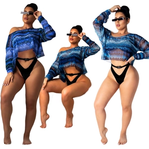 Women's two-piece set featuring blue snakeskin mesh crop top and black high-waist bikini bottom