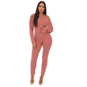 Detail of cable knit pattern on two-piece elastic off-shoulder sweater and pants set
