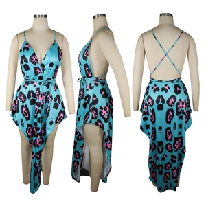 Detail of leopard print high-low dress featuring deep V-neck and crisscross back design