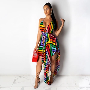 Detail of multi-color geometric print dress featuring V-neckline and irregular hemline