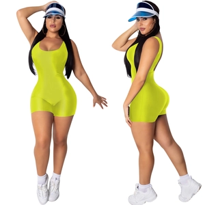 Neon green sleeveless one-piece romper with racerback cutout and glossy stretch fabric