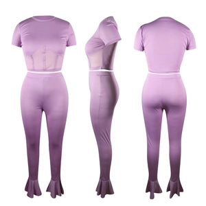 Detail view of mesh patchwork crop top and flared pants set from multiple angles