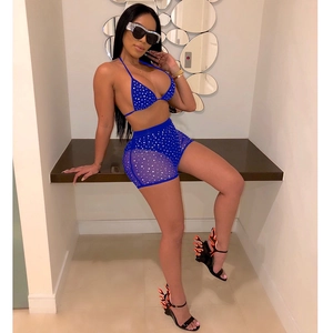 Detail view of blue mesh two-piece bikini set with sparkling silver rhinestones