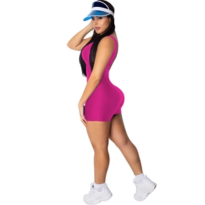 Detail of fuchsia sleeveless slim-fit romper featuring high-elasticity fabric and clean cut