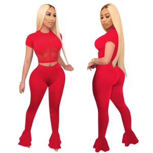 Red mesh patchwork two-piece set with fitted short top and flared pants for women