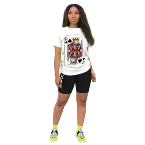 Close-up of white t-shirt with King of Spades print and matching black biker shorts