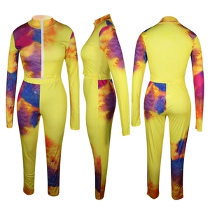 Detailed views showing the vibrant tie-dye pattern on this slim-fit women's tracksuit set