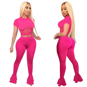 Detailed view of women's two-piece set featuring mesh splice top and ruffled flare pants