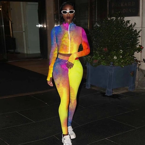 Detail of colorful tie-dye tracksuit with thumbhole cuffs and a stand-up collar