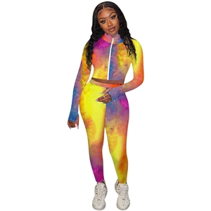 Detail of colorful nebula print crop top with zipper and matching high waist leggings