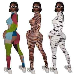 Women's tight activewear set featuring colorful animal print patterns in three styles