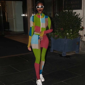 Detail of color-block geometric print on women two-piece tracksuit with zip-up jacket