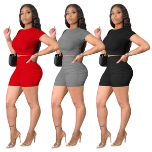 Women's 2-piece ribbed knit crop top and high-waisted ruched shorts set in multi colors