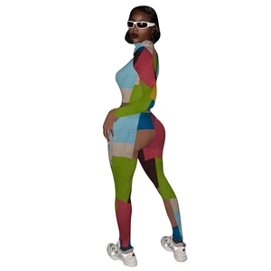 Detail of color block geometric pattern on slim fit long sleeve bodysuit and pants set