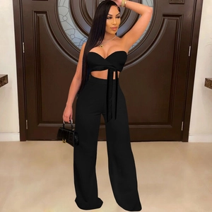 Women's chic solid black two-piece set featuring a halter wrap top and high-waist wide-leg pants
