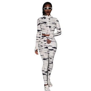 Detail of tiger print two-piece tracksuit with thumbhole cuffs and high waist leggings