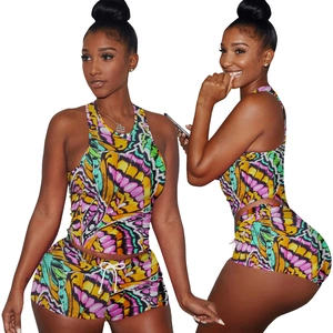 Women's 2-piece sportswear set featuring vibrant butterfly print top and drawstring shorts