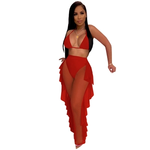 Detail of red sheer mesh high-waist pants and bikini top set with ruffled layers