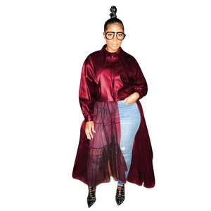Detail view of burgundy PU leather jacket with sheer mesh layered extension hem
