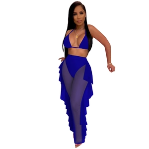 Detail of royal blue mesh pants with ruffled side seams for beach party set
