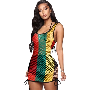 Detail of colorful hollow crochet mini dress with side drawstrings and mesh texture