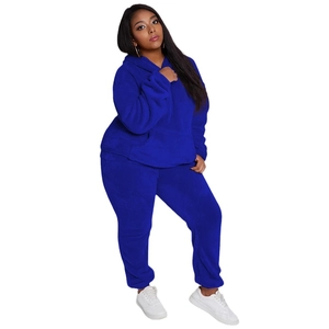 Women's royal blue plush loungewear set featuring a hooded sweatshirt and matching joggers