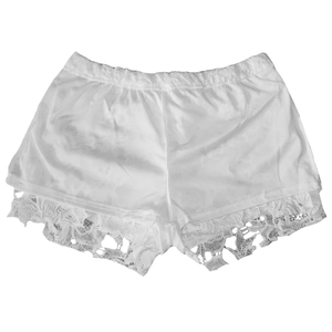 Detailed view of white satin loungewear shorts featuring elegant wide lace hem decoration