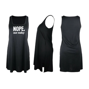 Detail view of black sleeveless top with white NOPE print and side split hemline
