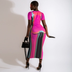 Detail of slim-fit midi dress featuring bold pink and blue abstract geometric prints