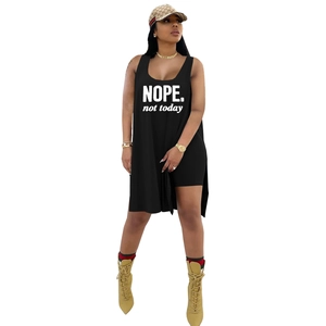 Detail of black long tank top with NOPE text and matching biker shorts two-piece set