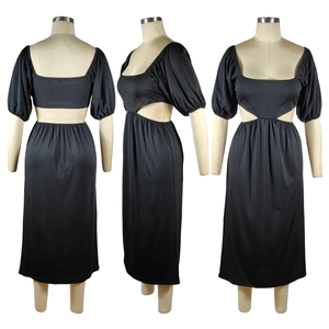 Détails de la robe noire pour femme avec manches bouffantes et découpes à la taille