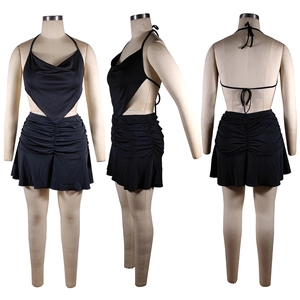 Detailed views of women's black two-piece set featuring halter crop top and pleated mini skirt